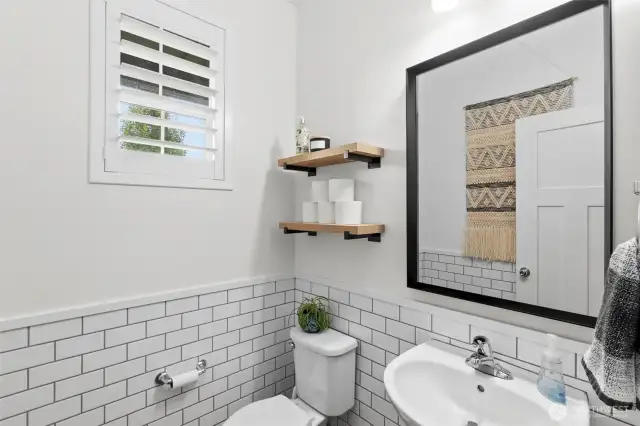 First floor tiled powder room.
