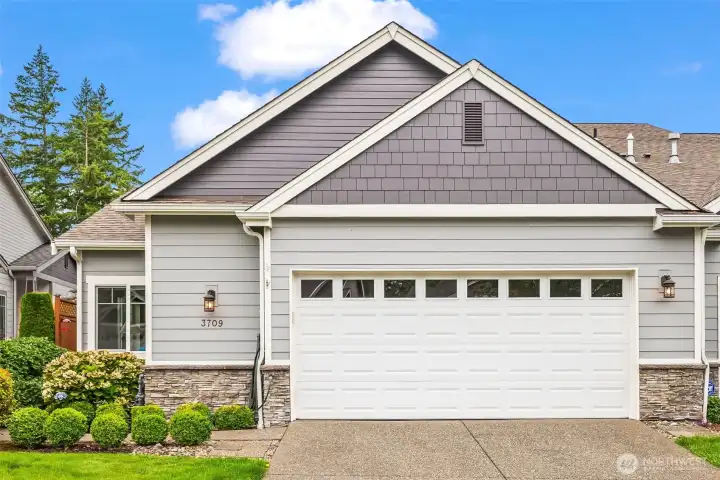This immaculate home boasts an abundance of curb appeal . The HOA maintains the exterior of the home and the front landscaping.