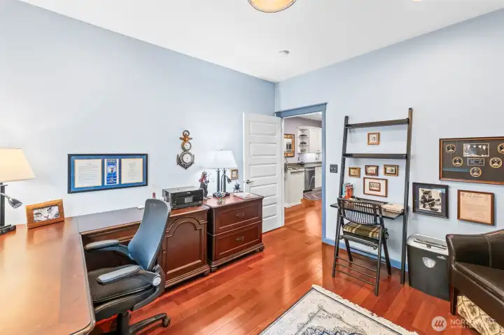 Guest bedroom on main level being utilized as an office.