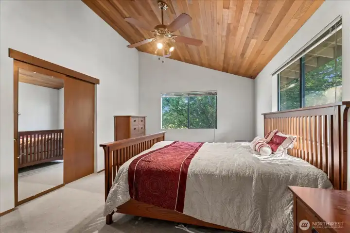 CEDAR LINED CEILINGS IN PRIMARY BEDROOM