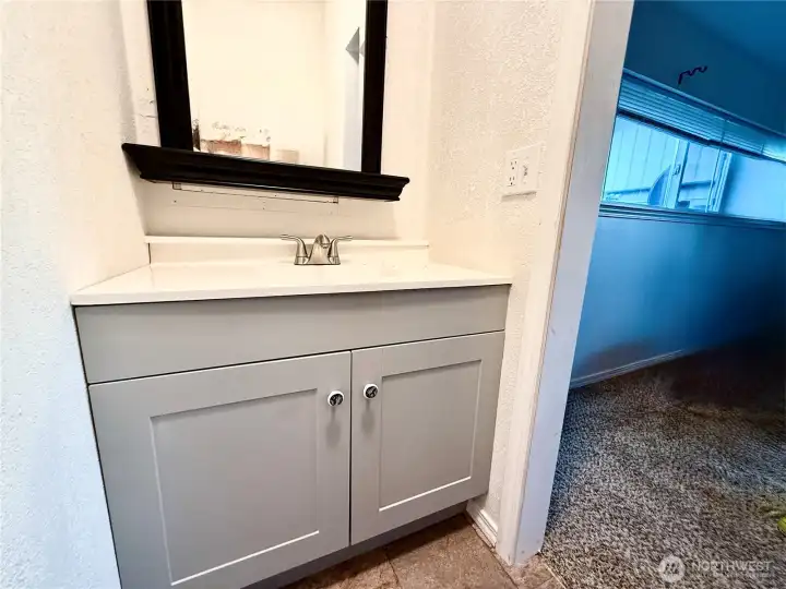Half bath in first bedroom