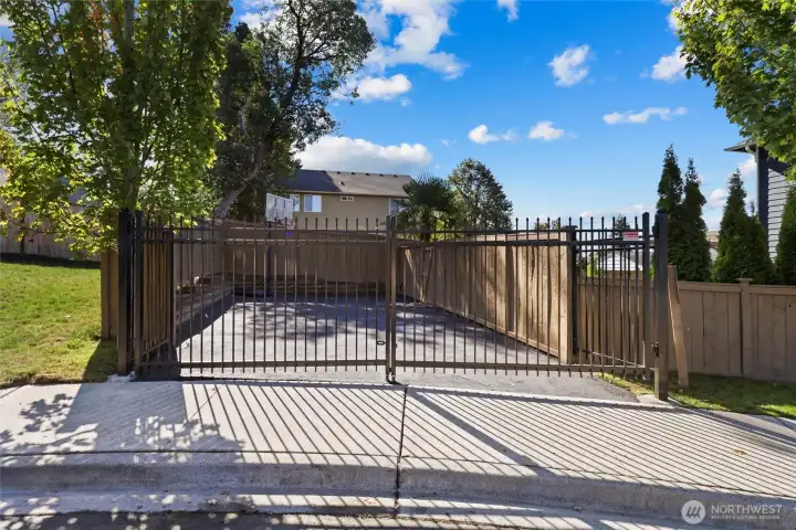 Fenced & gated sports court or RV parking or DADU.