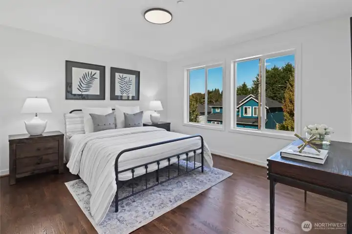 Primary bedroom is large enough for your private retreat.