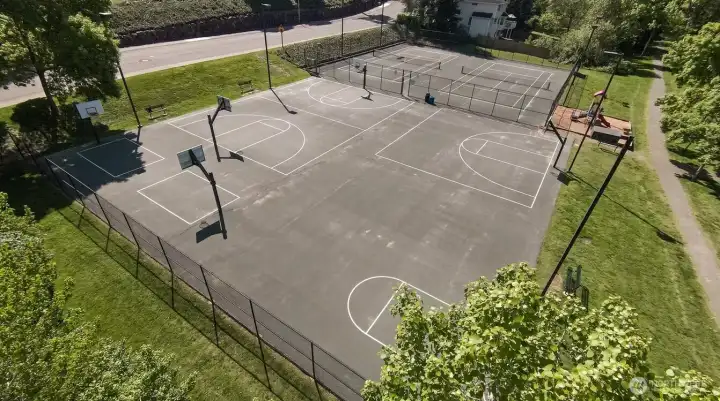A sports lovers dream - 9 basketball courts, 5 tennis courts, 4 pickleball courts. Staying active is easy, and low cost in Klahanie