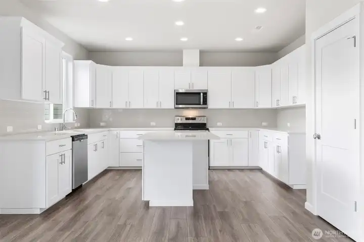 TONS of Storage in the Kitchen - Home Under Construction - Photos are not of actual home. Colors and finishes may vary. Photos may contain upgrades