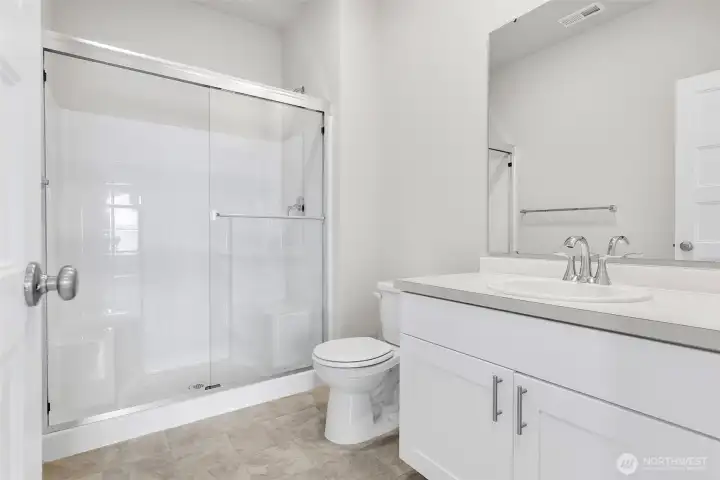 Main level 3/4 bath - Home Under Construction - Photos are not of actual home. Colors and finishes may vary. Photos may contain upgrades