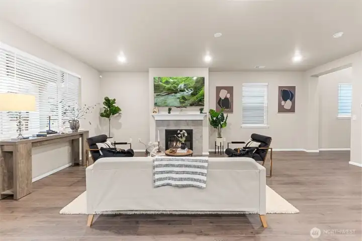 Light, bright and airy, this great room allows for comfortable entertaining.