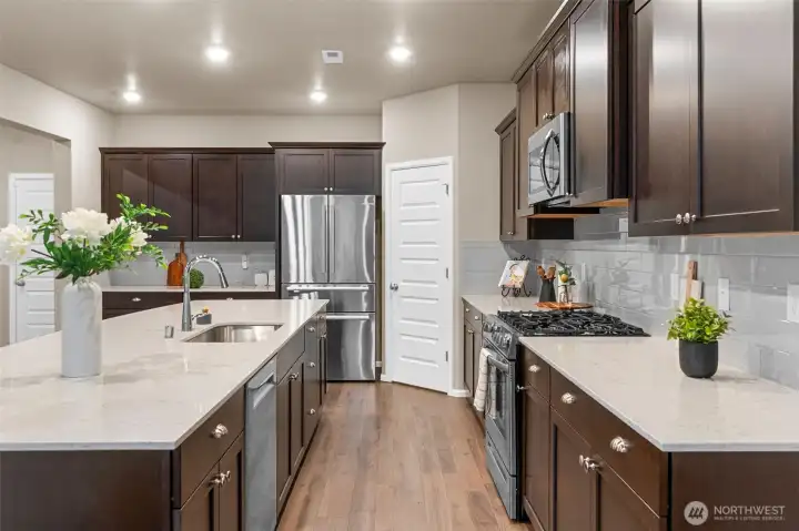 At almost 15 feet long, there is counterspace for every one of the Chefs helpers to work at!