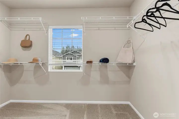 Enormous walk in closet.