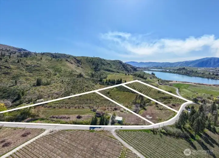 Subject property is the triangle lot on left.