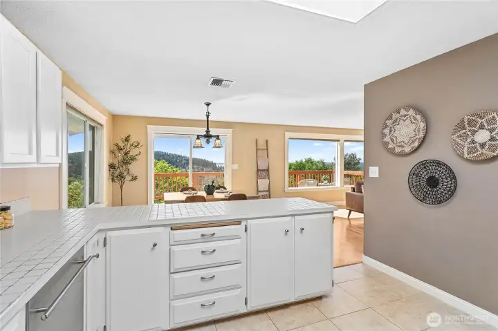 Extra large windows perfectly frame the spectacular bay, city, and mountain views