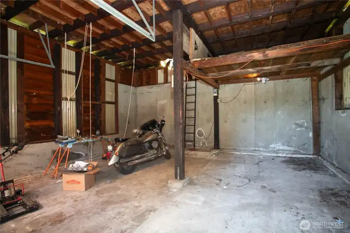 Inside detached garage and shop area