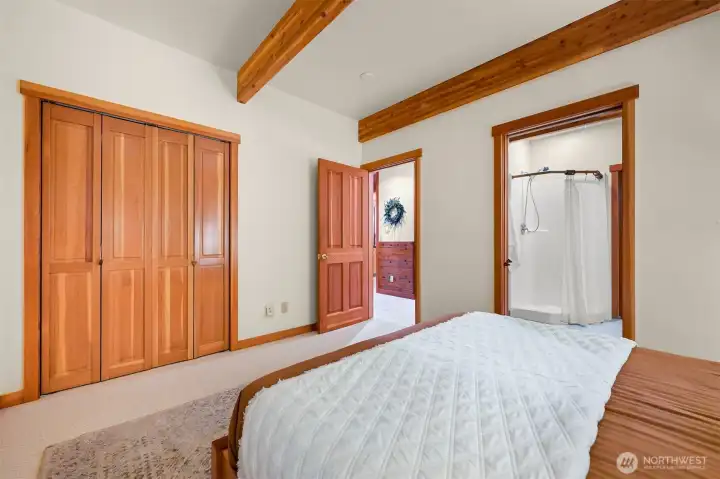 The guest suite offers generous closet space and direct access to the ensuite bath for everyday comfort and convenience.