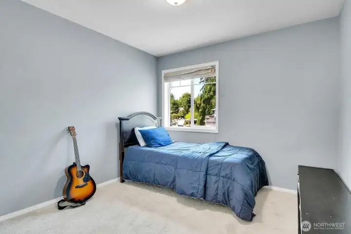 Spacious secondary bedroom with generous natural light and ample closet space. Spacious secondary bedroom with generous natural light and ample closet space.