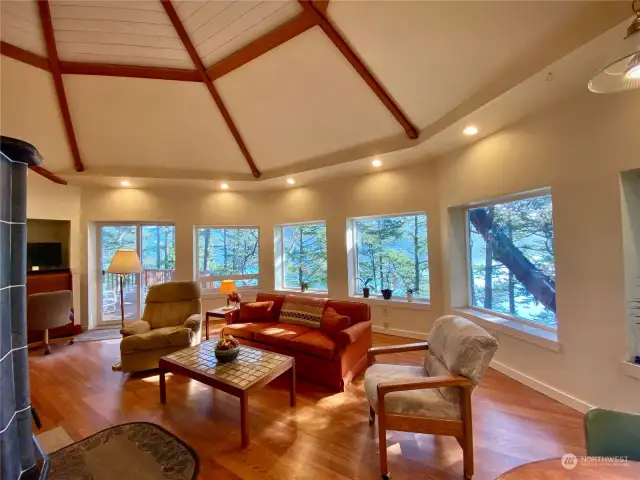 Large picture windows surround the great room offering up close and ever changing marine views over East Sound