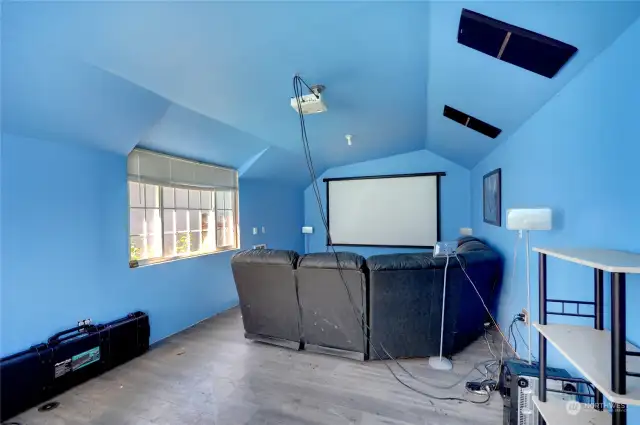 This is the enclosed carport that was converted into a finished bonus room used as a theater room.