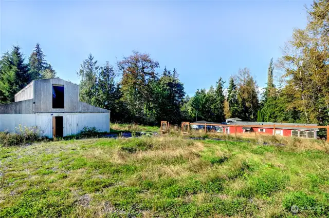 From the upper area of the property near the large barn, overlooking the homes