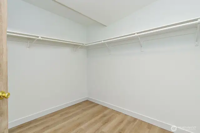 Primary closet virtually staged