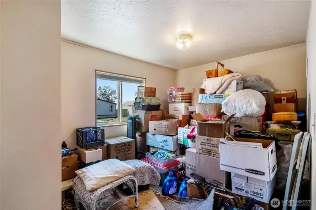 She's packing boxes and moving them to this bedroom #3 in hopes you'll come along with a great offer!