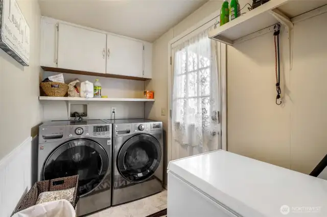 Laundry/utility room and back door with space enough for a chest freezer.