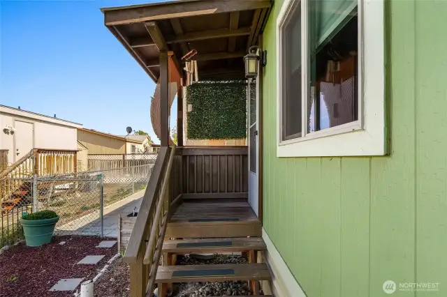Slide resistant covers added to covered front porch steps.