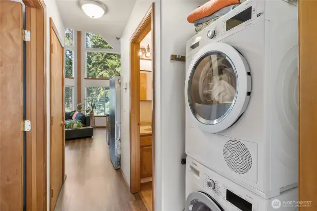 Laundry center located away from the main living space of the house.
