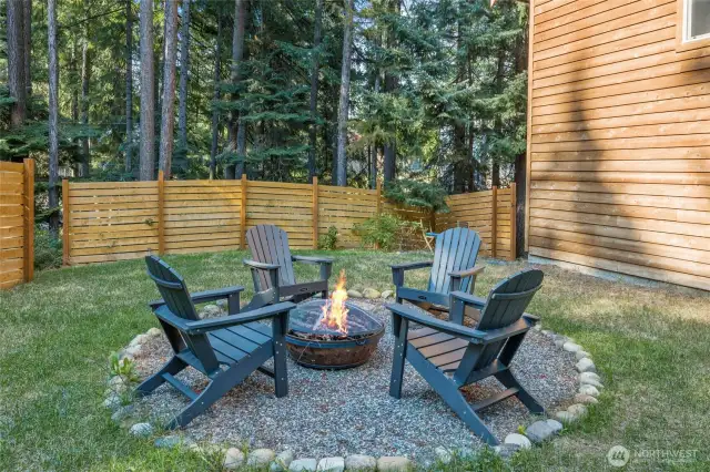Just imagine the stories that could be shared around the fire pit in this backyard!  Do not hesitate, this home is a gem and will not last long.