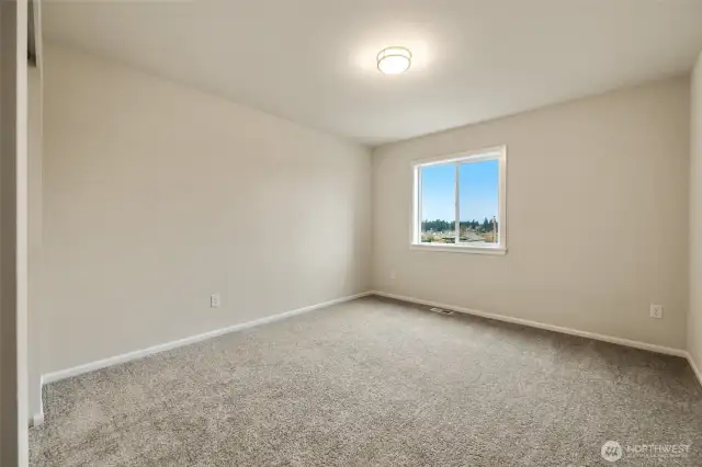 Bed#2-Disclaimer:  Photos are from another Rose floor plan in previous community, finishes, upgrades, and features will vary.