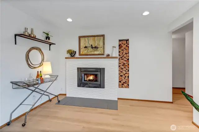 Second fire place insert has high end tile and old cedar mantel that came out of the puget sound!