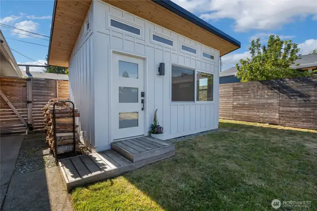 Office features high vaulted ceilings, huge windows, bamboo floors and heat/A/C.
