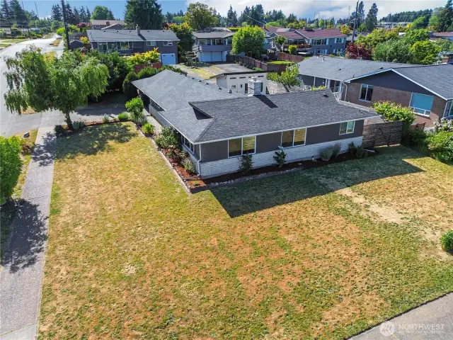 Double corner lot that gets tons of sun! Could have huge gardens here!
