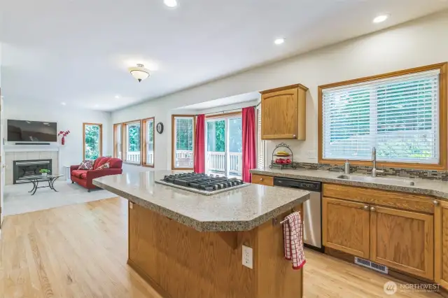 Eat-in kitchen at the nice sized island, or there is room before the slider for a kitchen table.