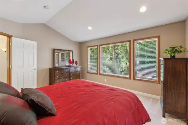 Wake up to the green of the parklike yard.