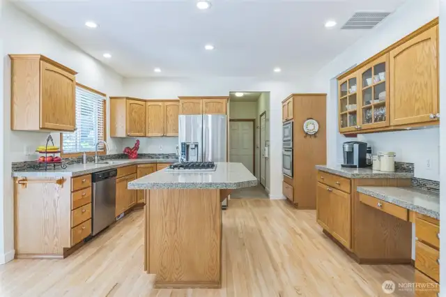 All appliances convey with property, including washer and dryer in laundry room just beyond the kitchen.