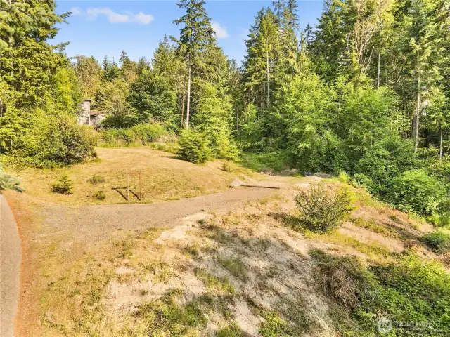 With room for a home on the upper cleared area, and ADU/Shop/Garage in the middle or lower area.