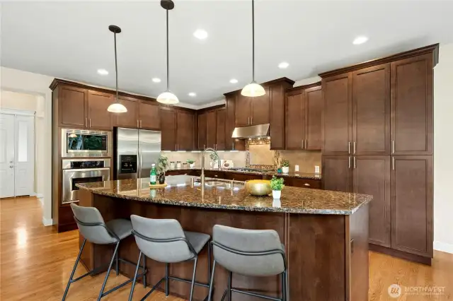Spacious Granite counter top with the  sitting soace