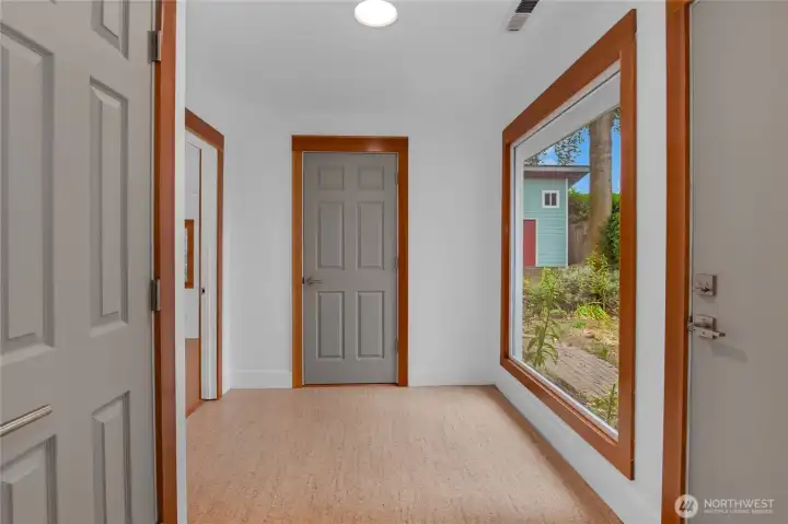 View from kitchen. Door to the right leads to back yard and door straight in front leads to the 3/4 bath/laundry room.