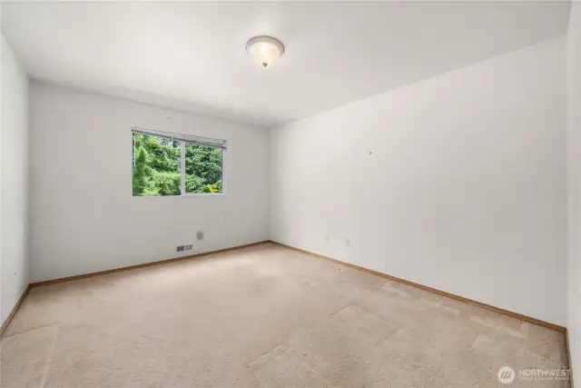 One of two additional rooms on upper level--office/entertainment/bedroom