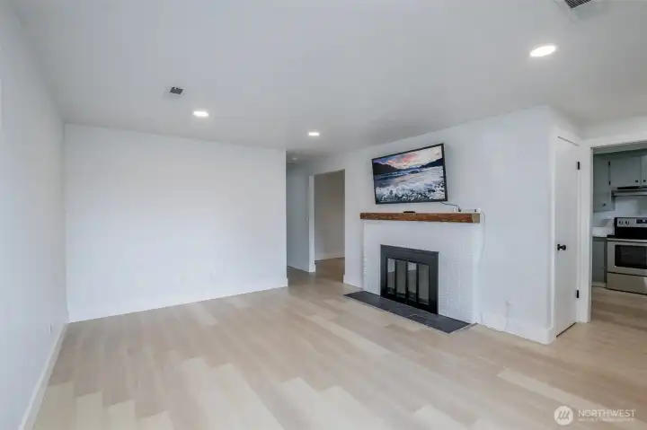 Living room. Wood Fireplace.  55" Samsung TV conveys with sale.