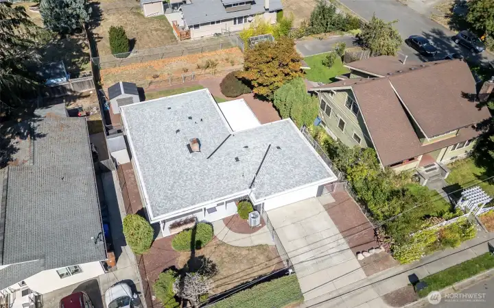Aerial Photo from SW to NE showing plenty of off street parking in addition to on-site curb parking + oversized 2 car attached garage.