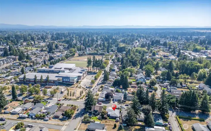 Aierial photo from North to South.  Notice that Baker Middle School & Parks Tacoma Sport Complex just 500' away :-)  Great for walking, playing & sporting!  Both Elementary & Middle Schools are within extremely close distance for an easy walk to school :-)