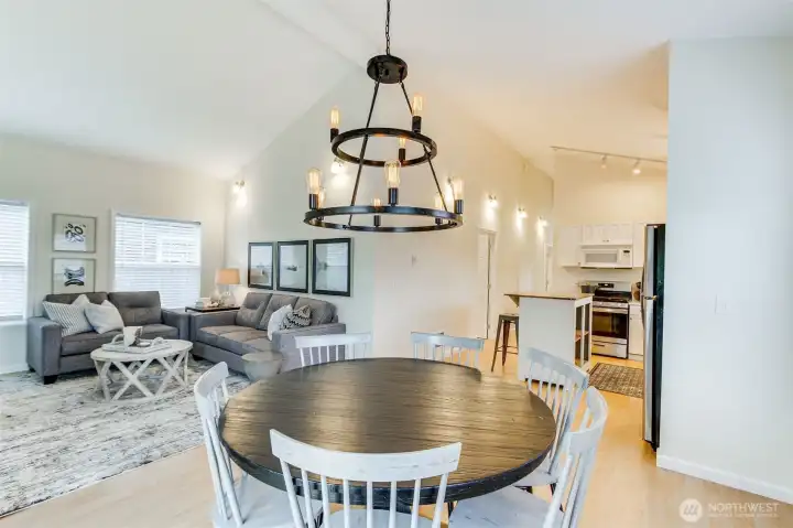 Vaulted ceiling add space to this cottage as well as the large deck off this space.
