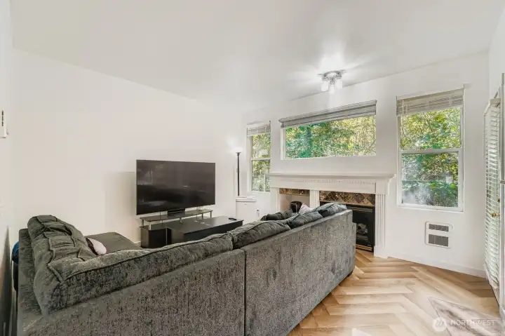 Enjoy cozy nights by the fire in your inviting family room.