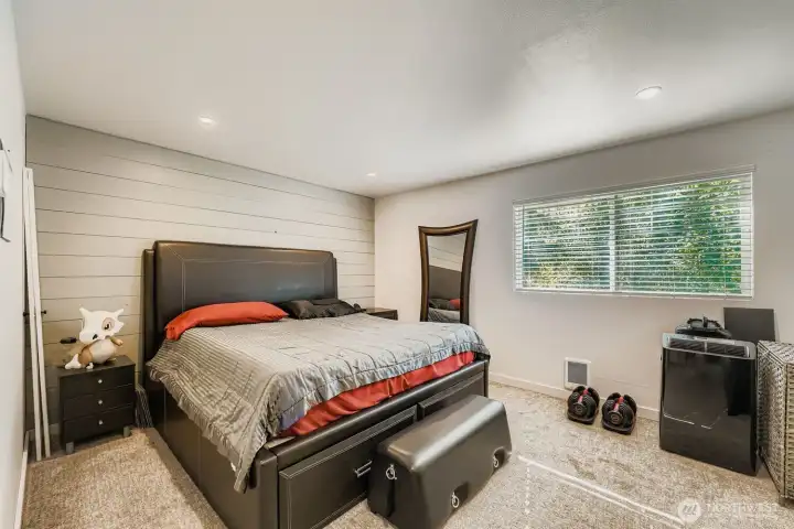 Tranquil primary suite overlooking the greenbelt.