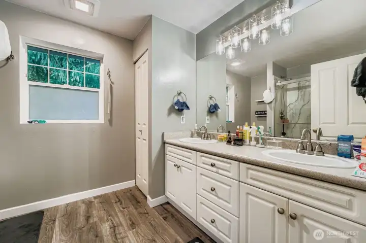 The primary bath features a spacious step-in shower.