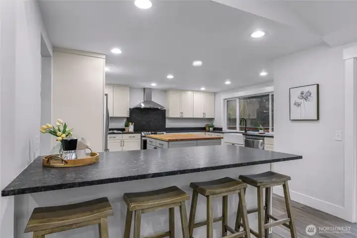 Large island for additional eating space, entertaining or work station!