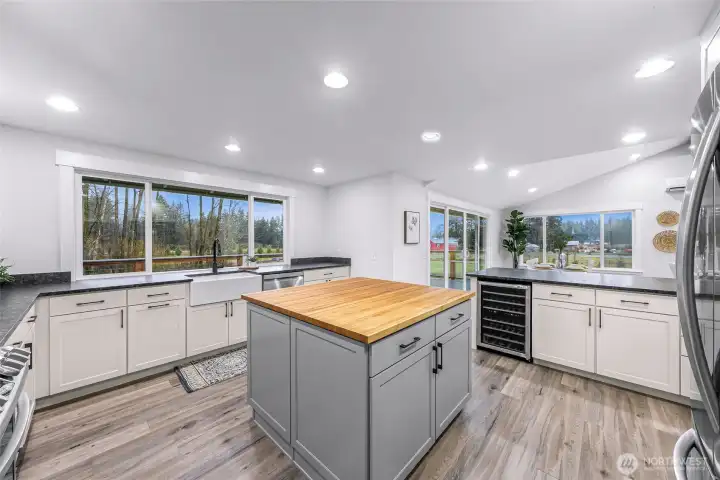 All cabinets are Aristokraft with soft close and pull outs for easy access and organization. Wine & beverage cooler too!