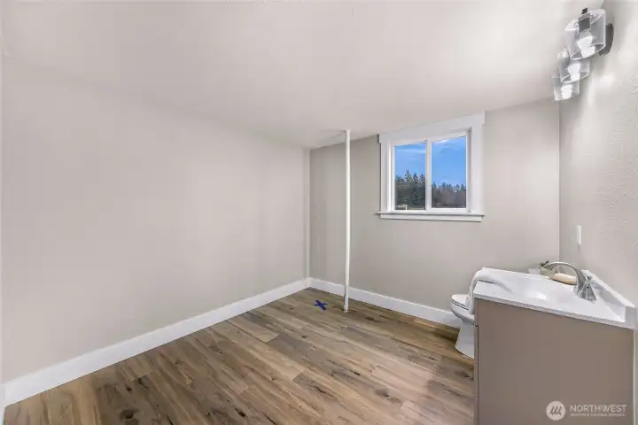 Installed as a 1/2 bath but ready to be converted into full if you desire, there are drains in the floor ready for a tub or shower, you could even add second laundry