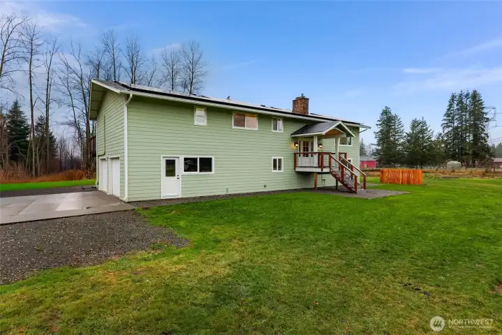 Two car garage with plenty of additional parking on site, garage has additional access door to the main yard