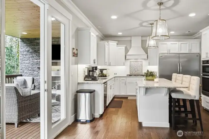 French doors leading to outdoor entertainment area.